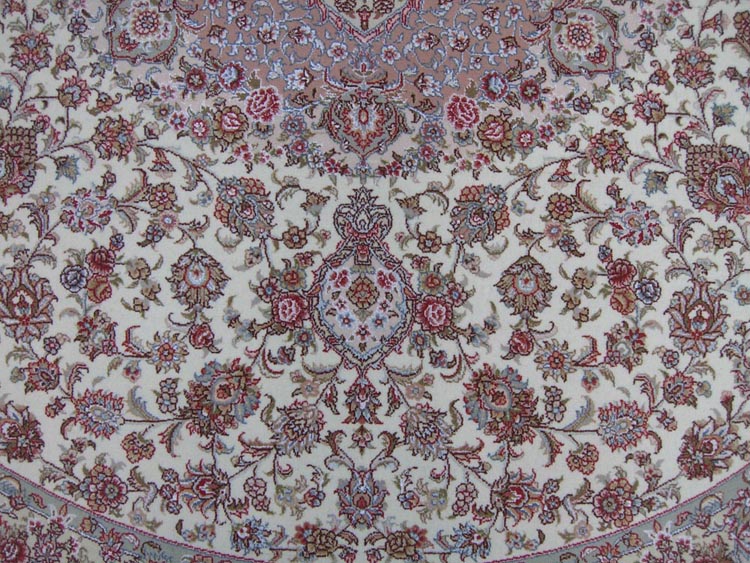 field of  round shape silk and wool carpet