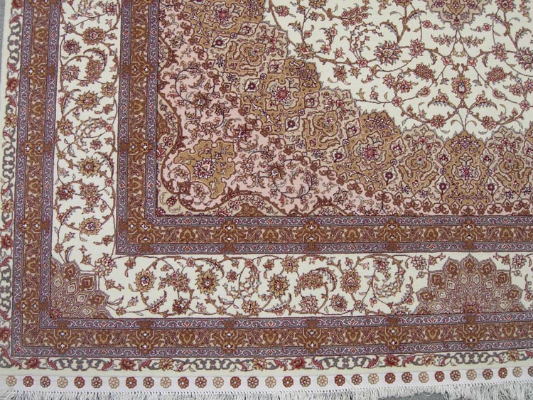 white border of Nain design silk and wool carpet