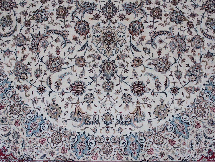white field of Nain design silk rug