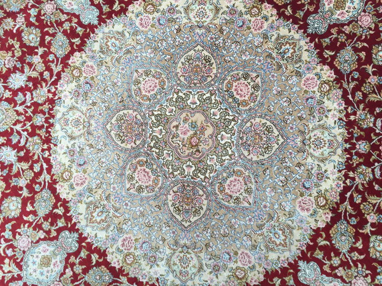 field of round shape silk carpet