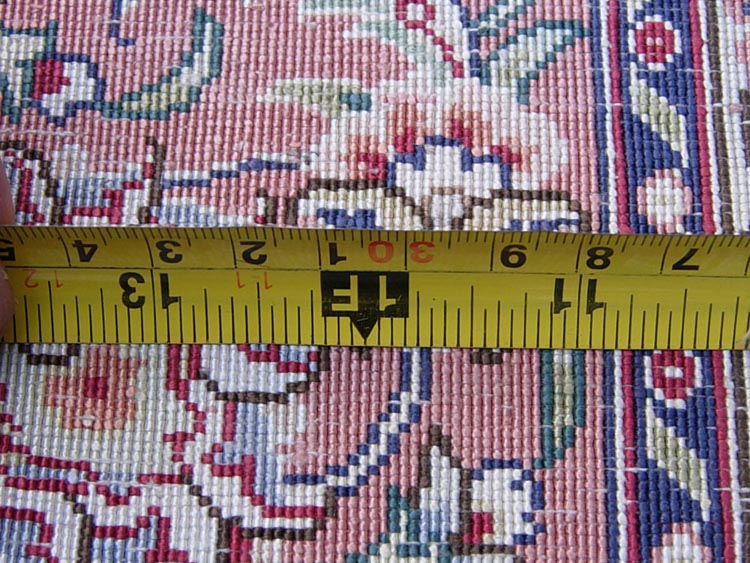 workmanship of oriental silk carpet