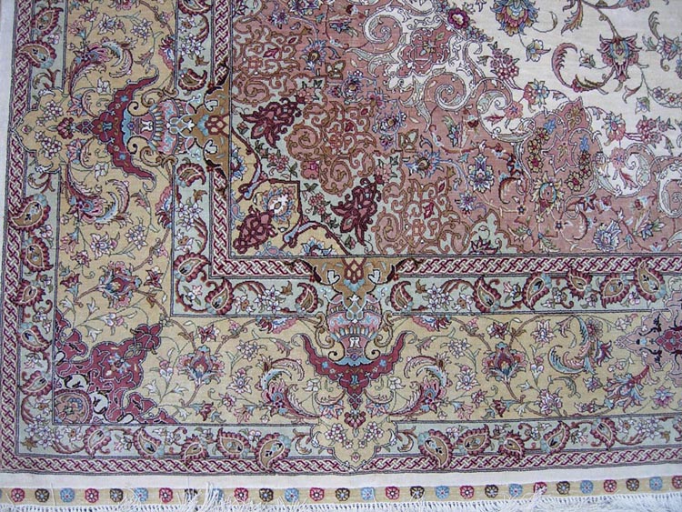 the corner of hand-made oriental silk carpet