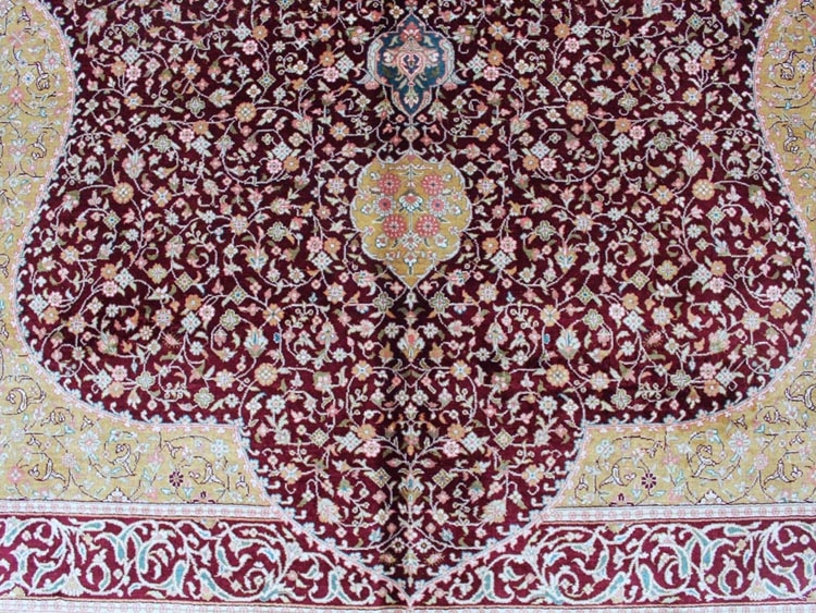 red and golden color of Qum design silk carpet field