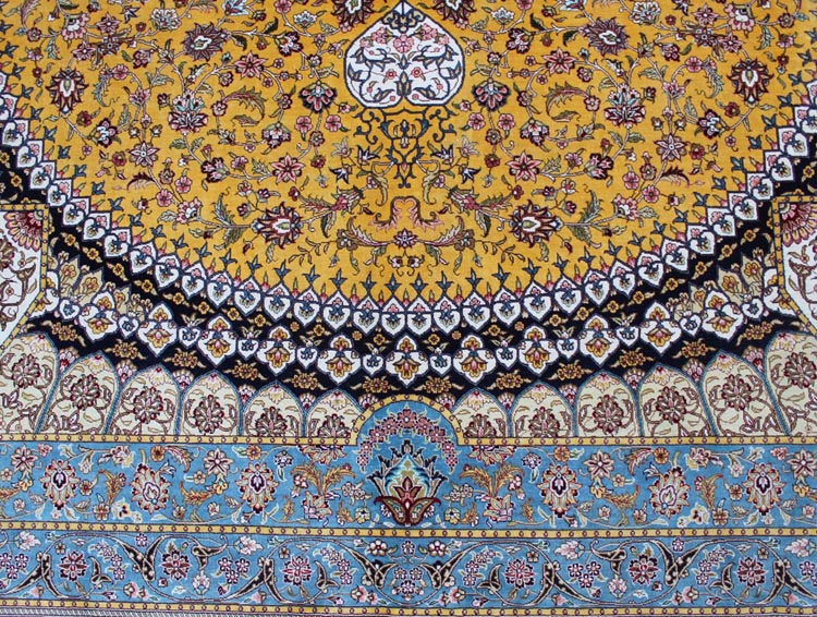 golden field on Isfahan silk rug
